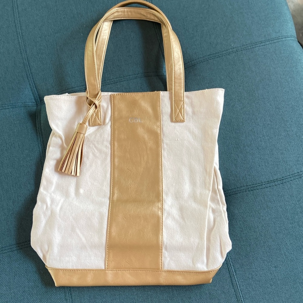 Sale 2/$10 * Canvas bag w/gold polyurethane handles, tassel, monogrammed CBL.